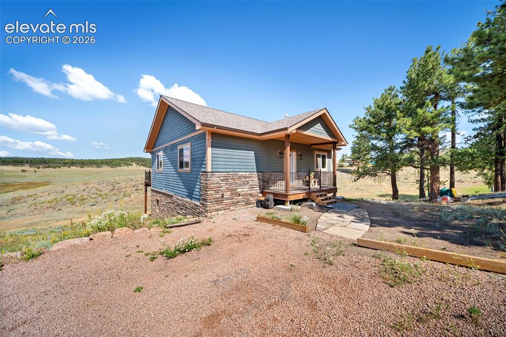 351 High Pasture Road Florissant, CO 80816 - Photo 3 of 39 Beautifully finished exterior in a peaceful setting.