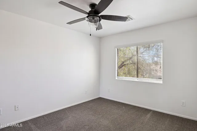 a view of a garden with a fountain