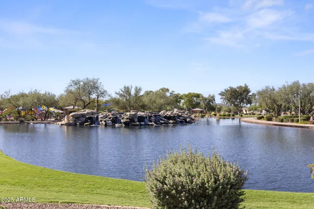 a view of a swimming pool with a lounge chair