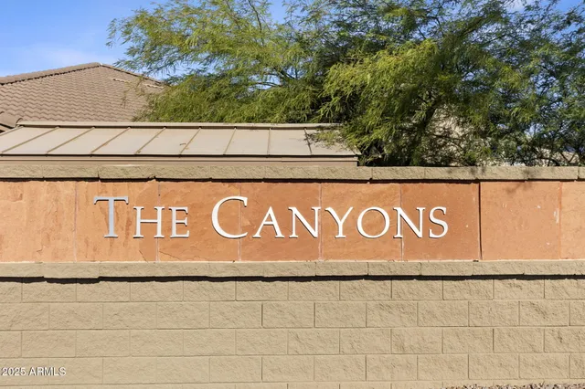 a view of a golf course with a trees