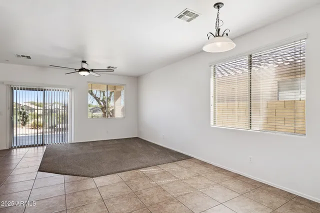 a view of a kitchen with a sink cabinets and a window