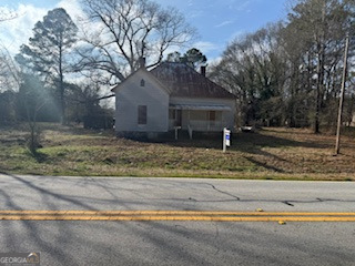 303 County Line Road Fayetteville, GA 30215 - Photo 1 of 1 a view of a house with a yard