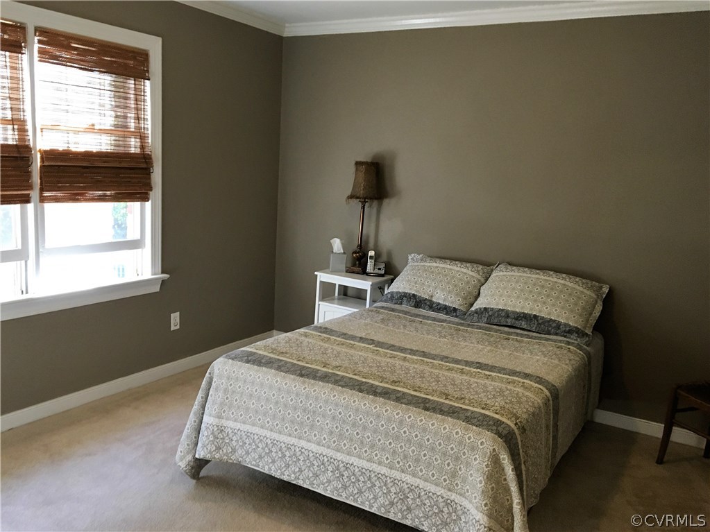 1900 Castlebridge Road Midlothian, VA 23113 - Photo 18 of 28 a bedroom with a bed and a window
