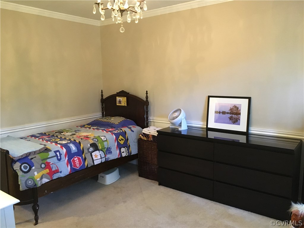 1900 Castlebridge Road Midlothian, VA 23113 - Photo 19 of 28 a bedroom with a bed dresser and a window