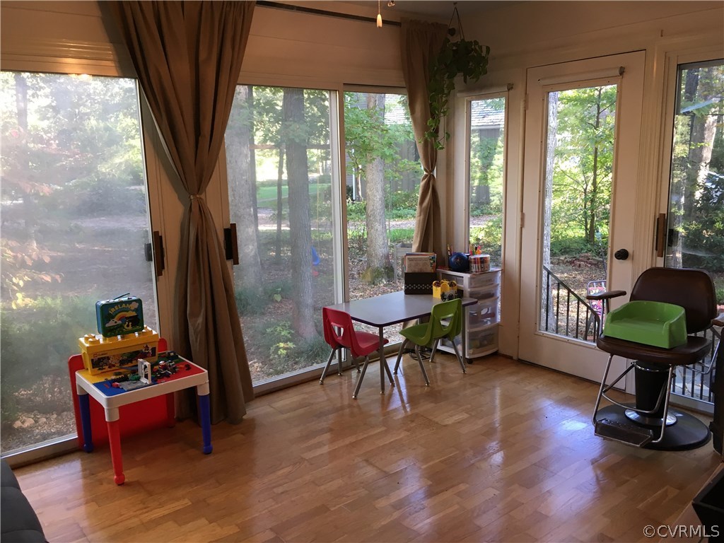 1900 Castlebridge Road Midlothian, VA 23113 - Photo 8 of 28 a living room filled with furniture and a floor to ceiling window