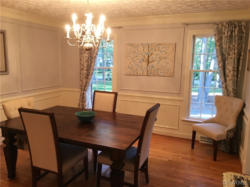 1900 Castlebridge Road Midlothian, VA 23113 - Photo 10 of 28 a view of a dining room with furniture and wooden floor