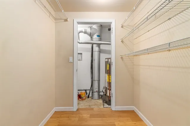 a view of entryway with wooden floor