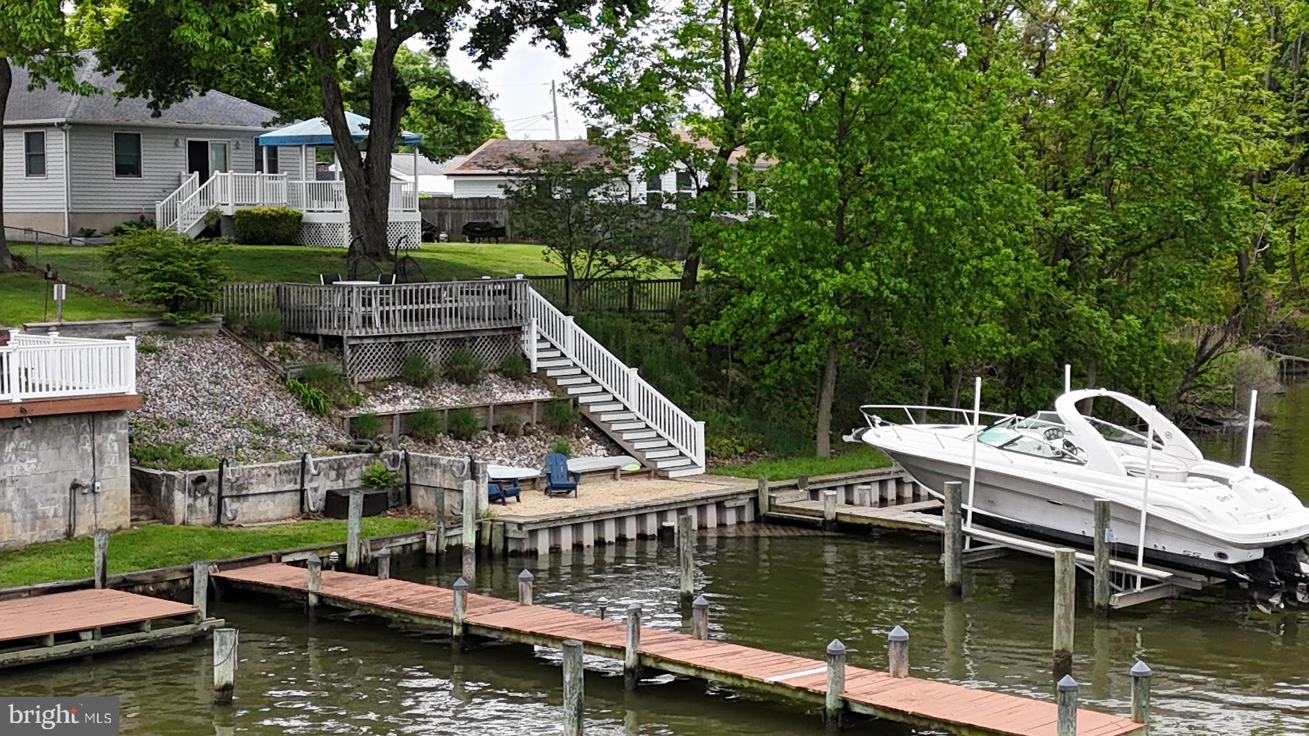 2222 Monocacy Road Essex, MD 21221 - Photo 61 of 70 Serene lakeside retreat with boat dock.