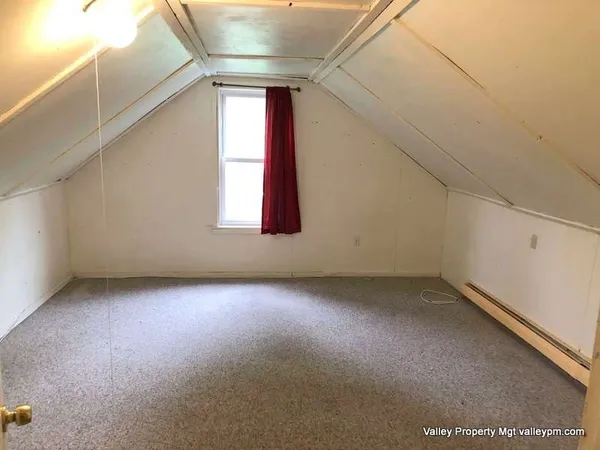 a view of a room that has window in it