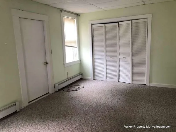 an empty room with windows