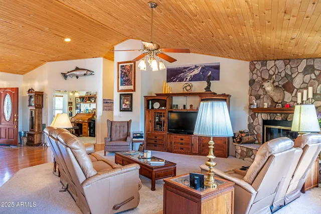 a spacious bedroom with a bed and a window