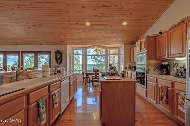 a spacious bathroom with a double vanity sink mirror and