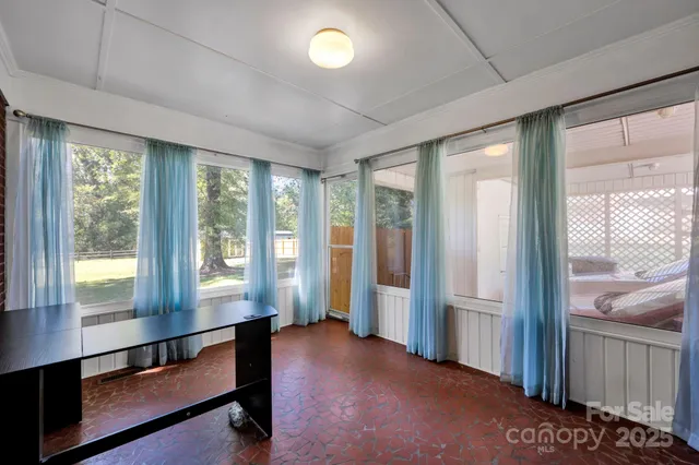 a view of room with window and hardwood floor