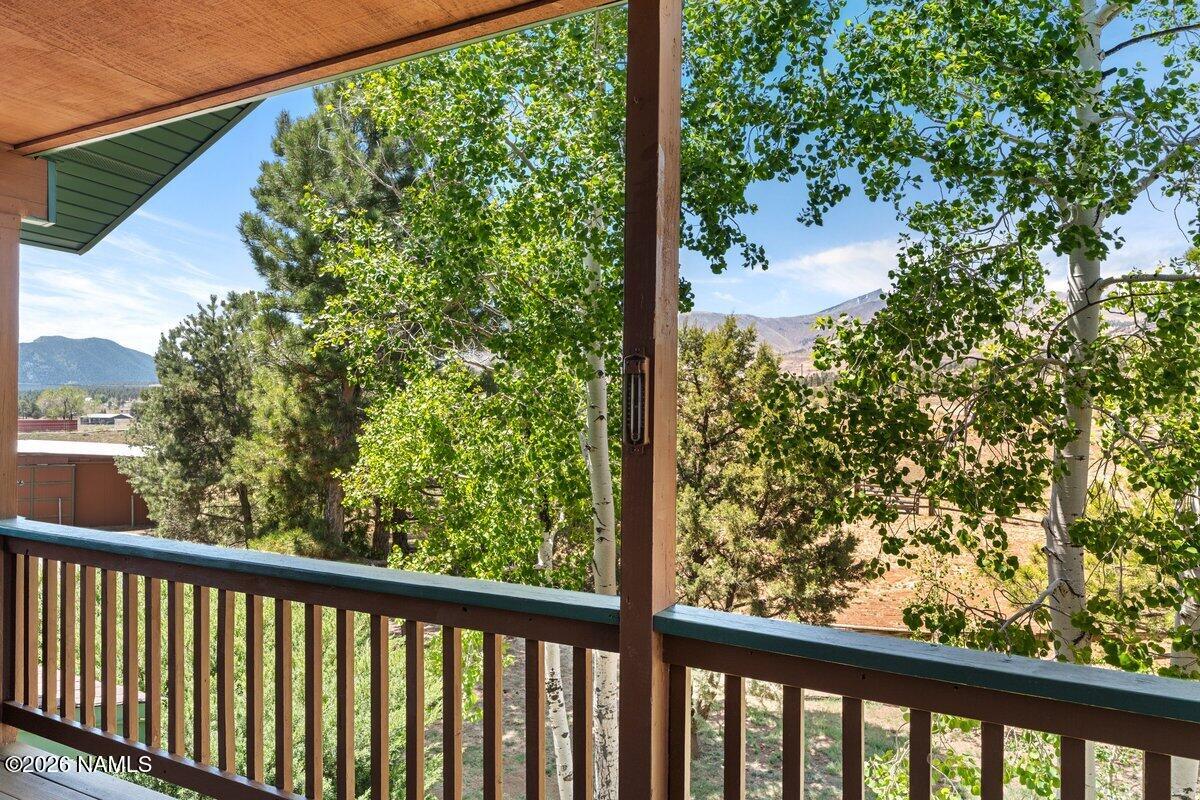 5535 East Western Star Road Flagstaff, AZ 86004 - Photo 26 of 44 a view of a garden from a balcony