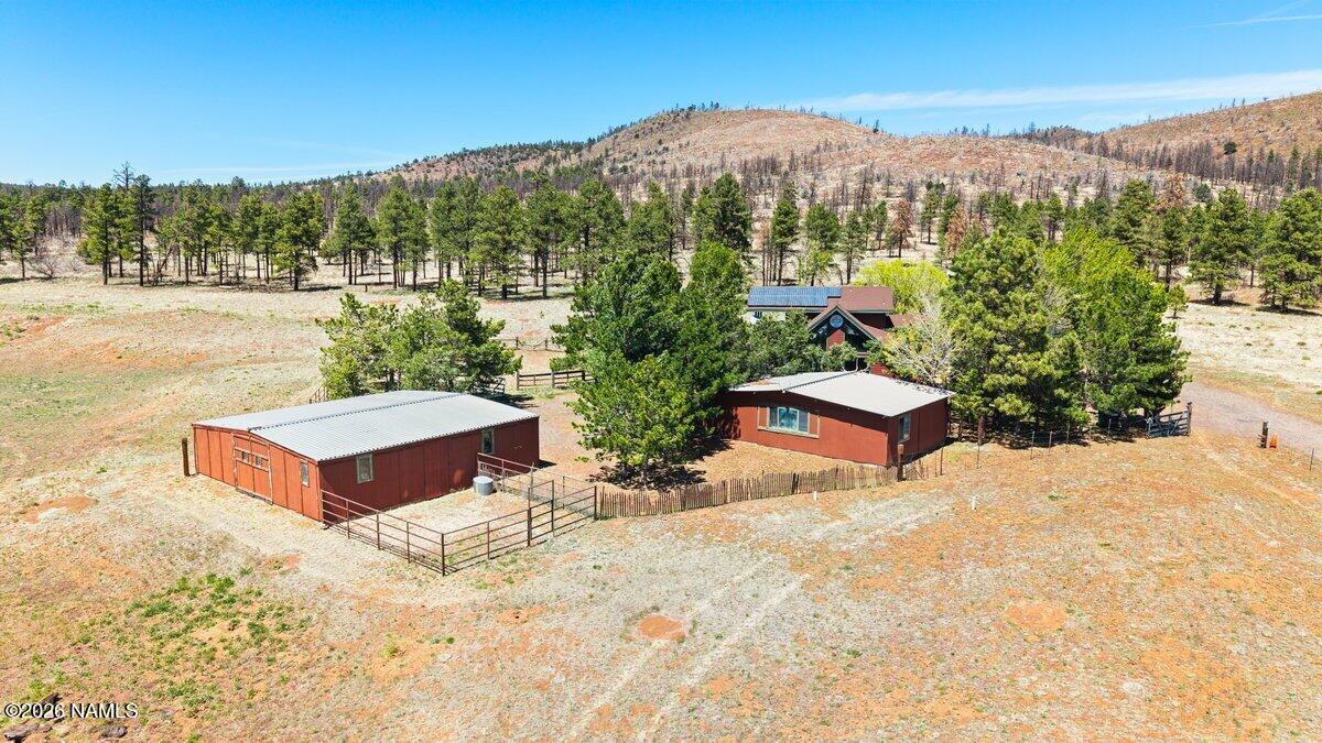 5535 East Western Star Road Flagstaff, AZ 86004 - Photo 31 of 44 a view of a backyard with sitting area