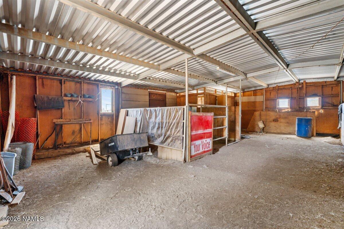 5535 East Western Star Road Flagstaff, AZ 86004 - Photo 33 of 44 a view of a room with wooden ceiling
