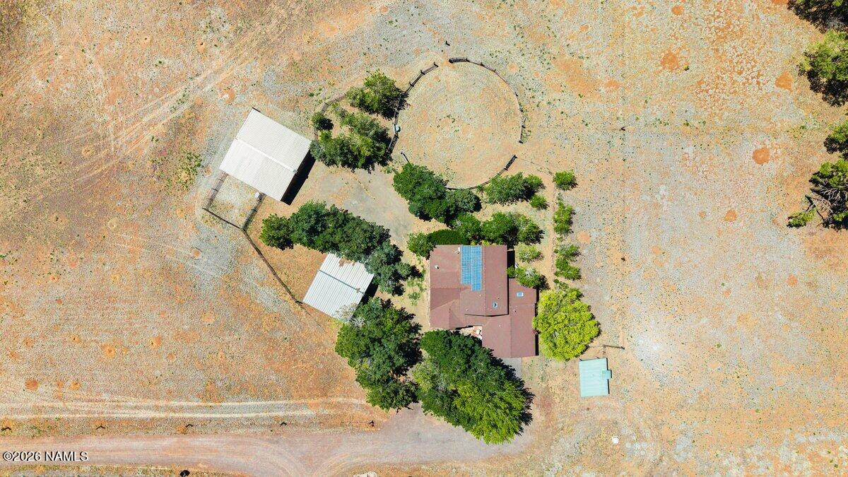 5535 East Western Star Road Flagstaff, AZ 86004 - Photo 40 of 44 an aerial view of a house with a yard and a fountain