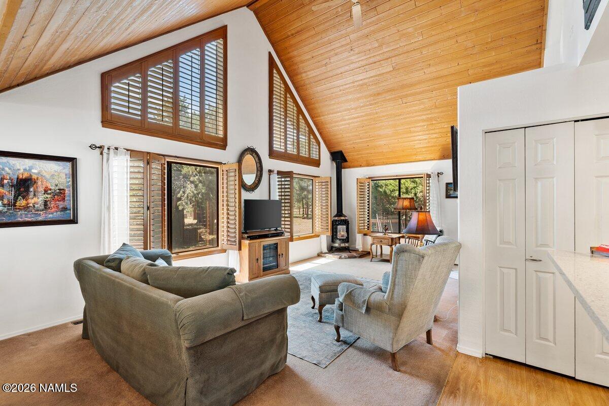 5535 East Western Star Road Flagstaff, AZ 86004 - Photo 6 of 44 a living room with furniture and a window