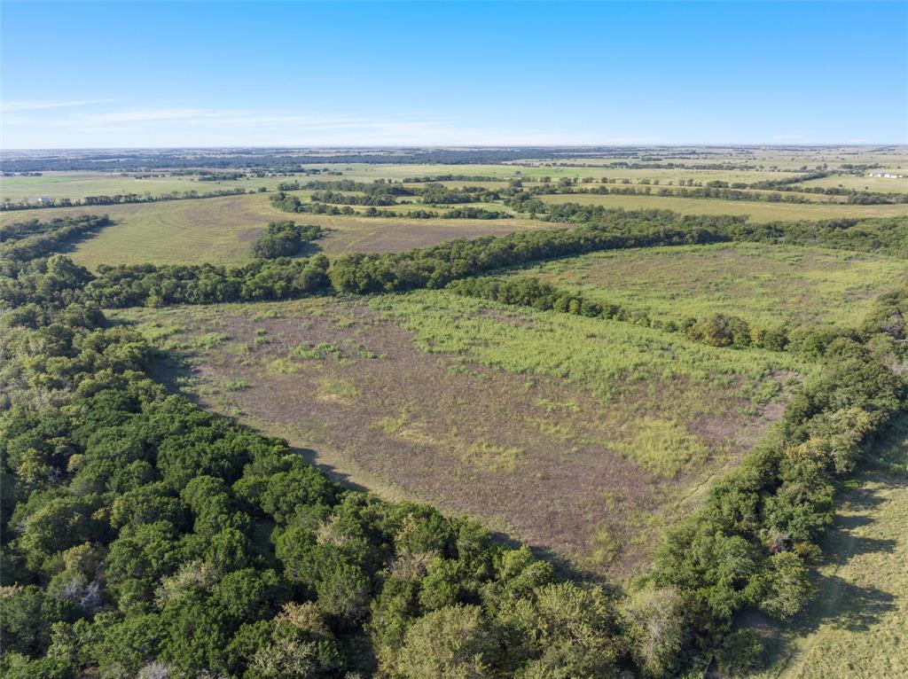 902 Mattlage Road Crawford, TX 76638 - Photo 16 of 32 Aerial overview of property's location with rural landscape