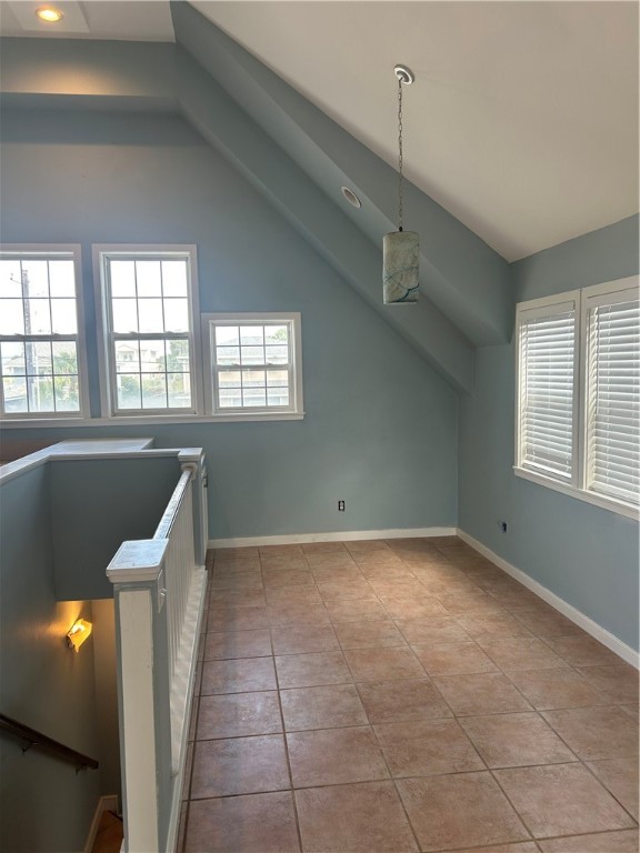 902 Eleventh Street Port Aransas, TX 78373 - Photo 8 of 16 a view of an empty room with window and stairs