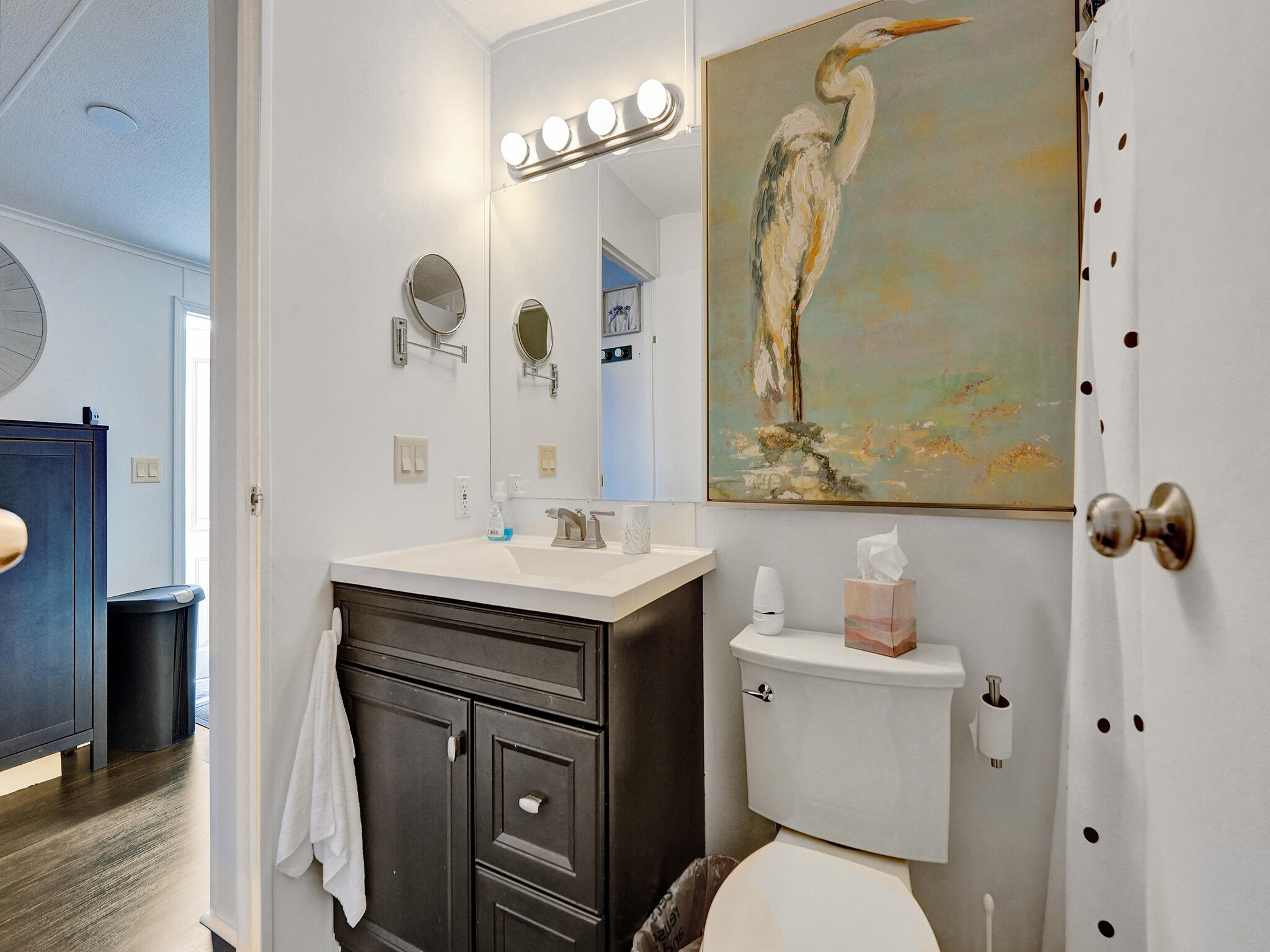 14609 Sunset Drive Delray Beach, FL 33445 - Photo 20 of 50 a bathroom with a sink a toilet and shower