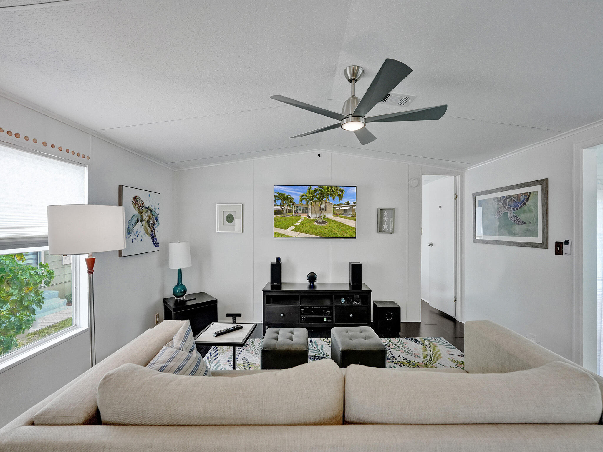 14609 Sunset Drive Delray Beach, FL 33445 - Photo 22 of 50 a living room with furniture and a window
