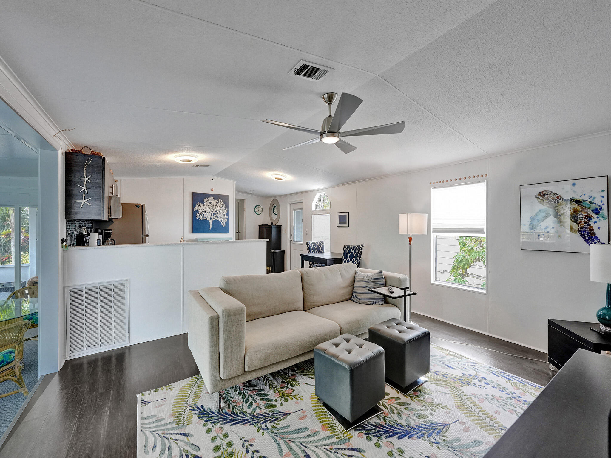 14609 Sunset Drive Delray Beach, FL 33445 - Photo 24 of 50 a living room with furniture and a wooden floor