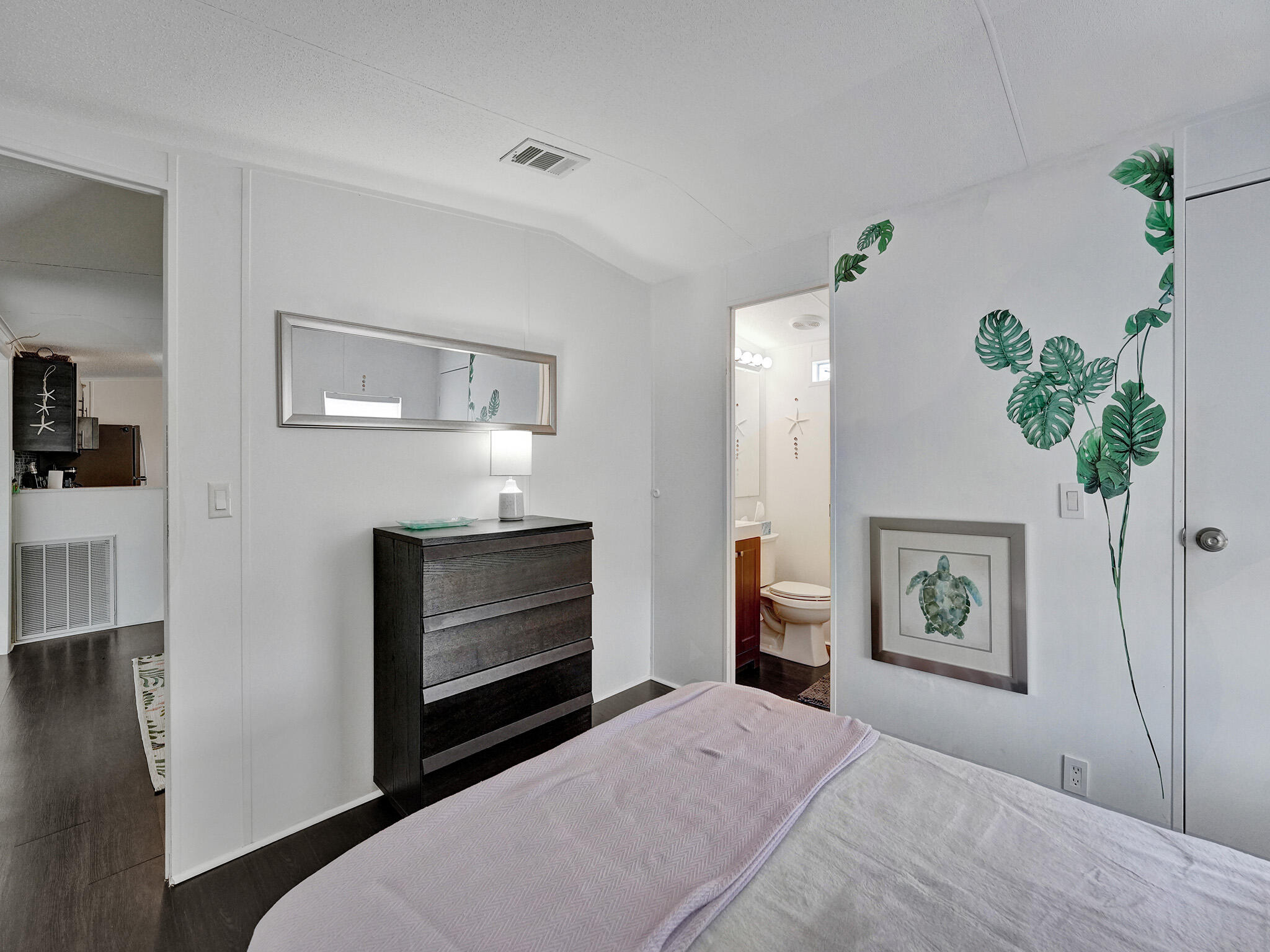 14609 Sunset Drive Delray Beach, FL 33445 - Photo 33 of 50 a bedroom with a bed and a dresser