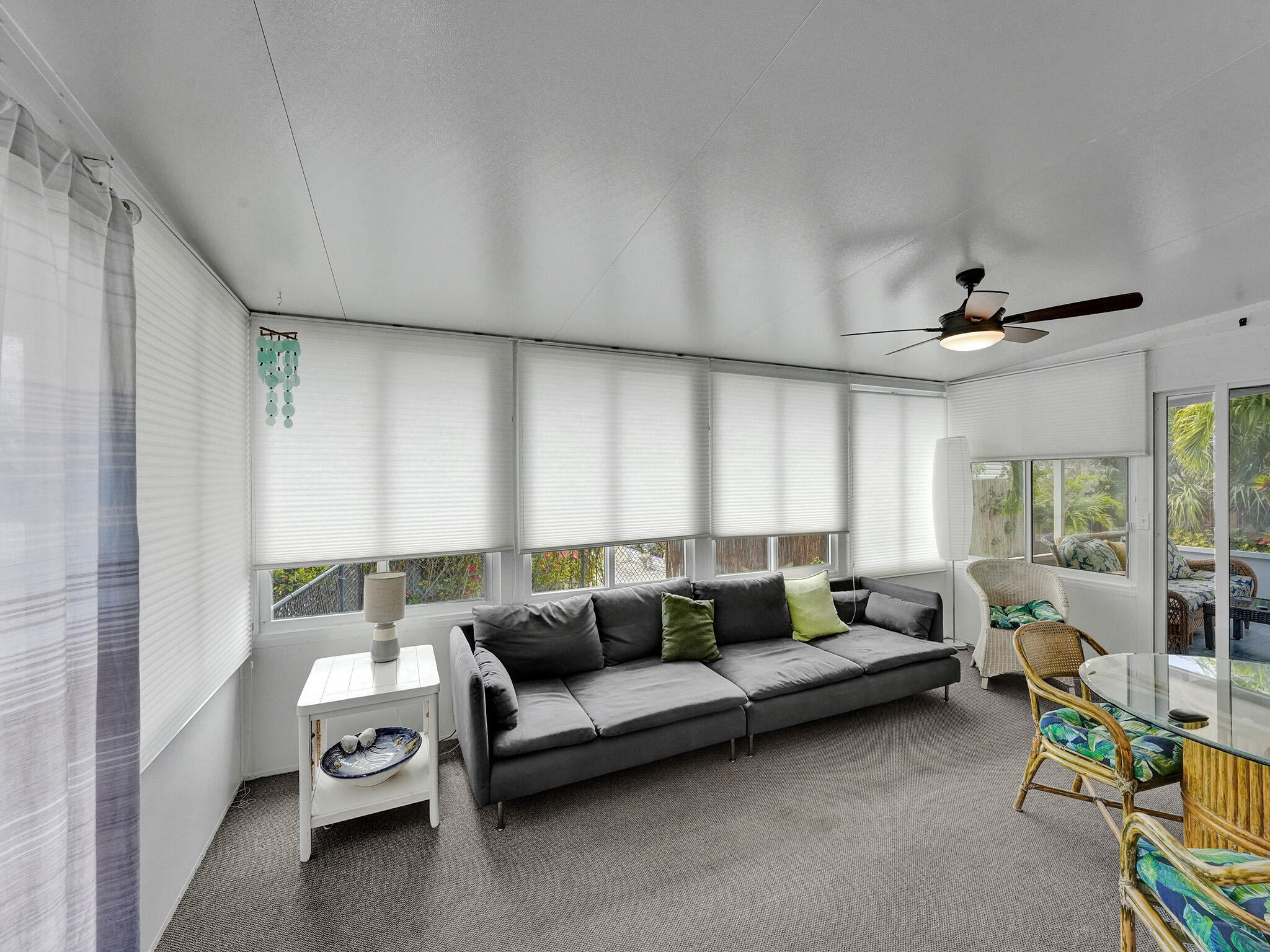 14609 Sunset Drive Delray Beach, FL 33445 - Photo 36 of 50 a living room with furniture and a large window