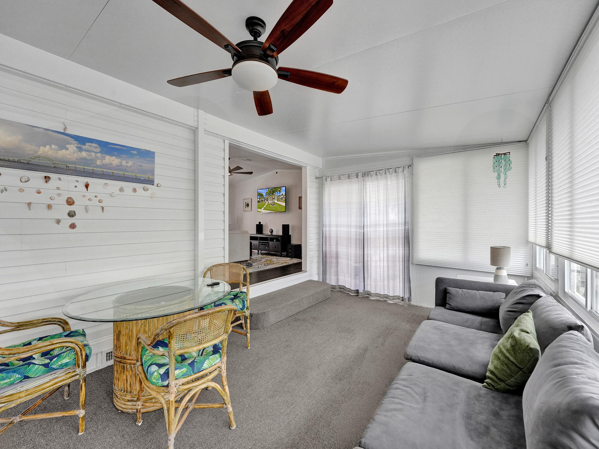 14609 Sunset Drive Delray Beach, FL 33445 - Photo 38 of 50 a living room with furniture and a window