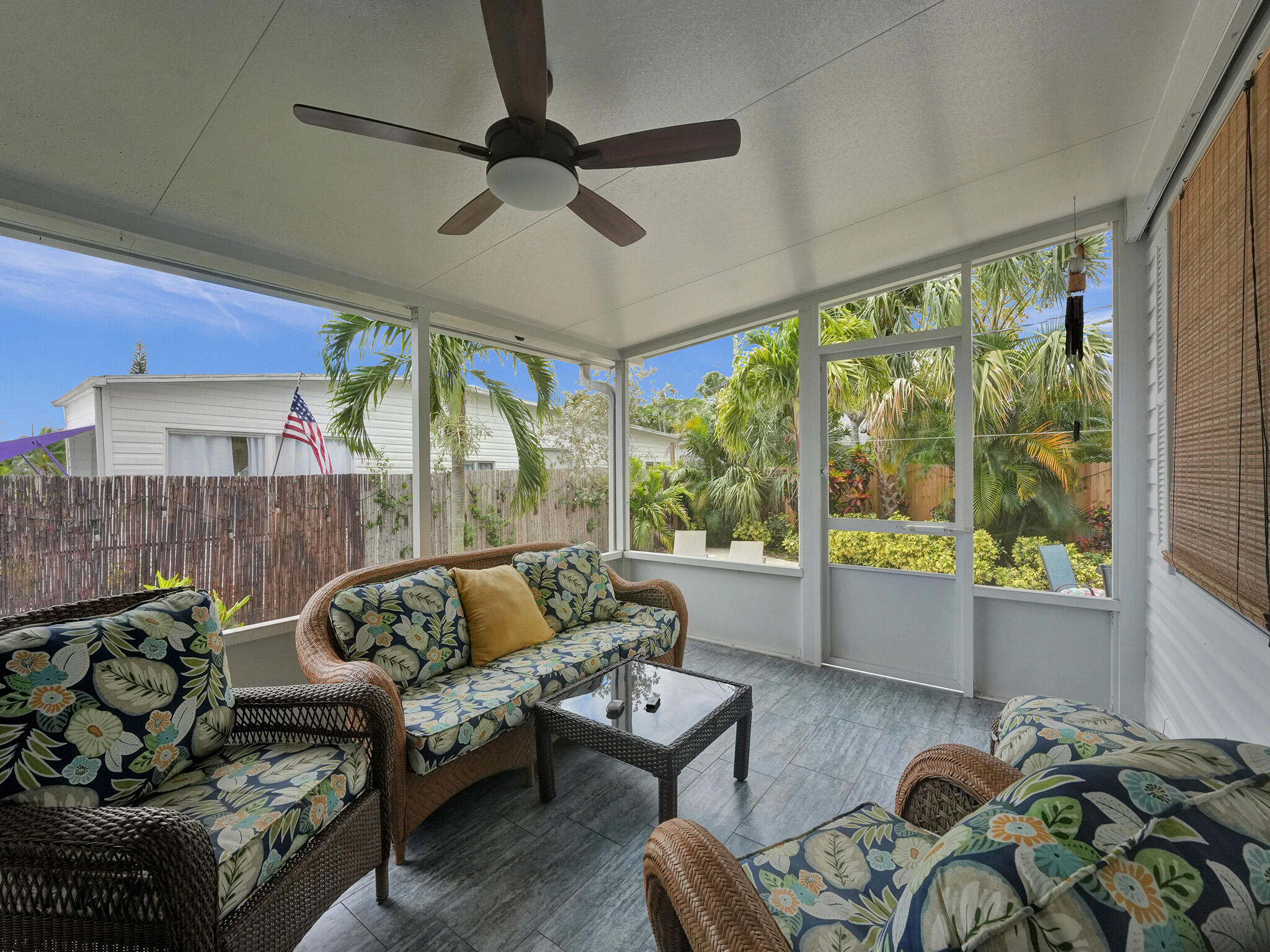 14609 Sunset Drive Delray Beach, FL 33445 - Photo 40 of 50 a living room with furniture and a large window
