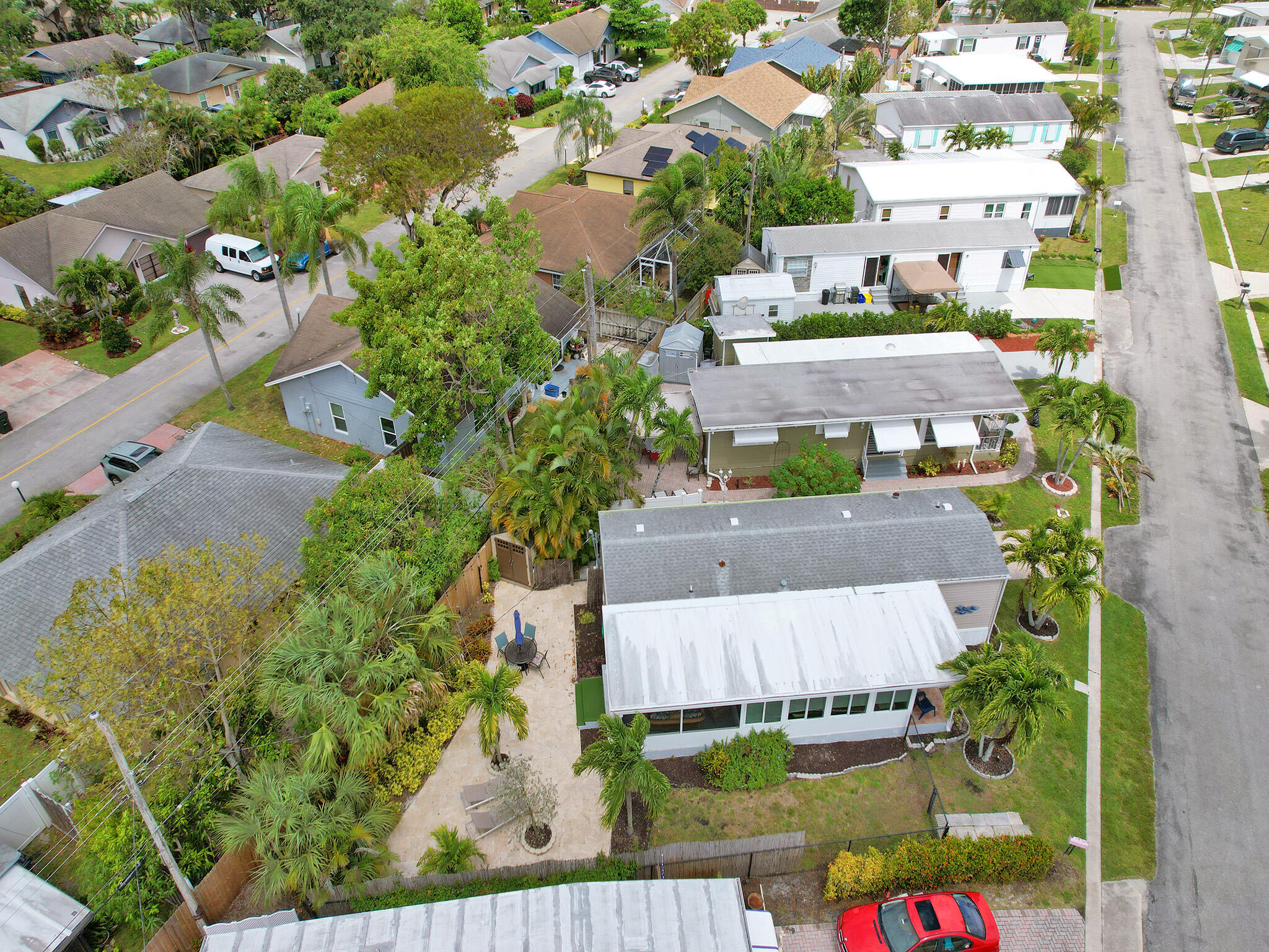 14609 Sunset Drive Delray Beach, FL 33445 - Photo 45 of 50 an aerial view of a house with yard swimming pool and outdoor seating
