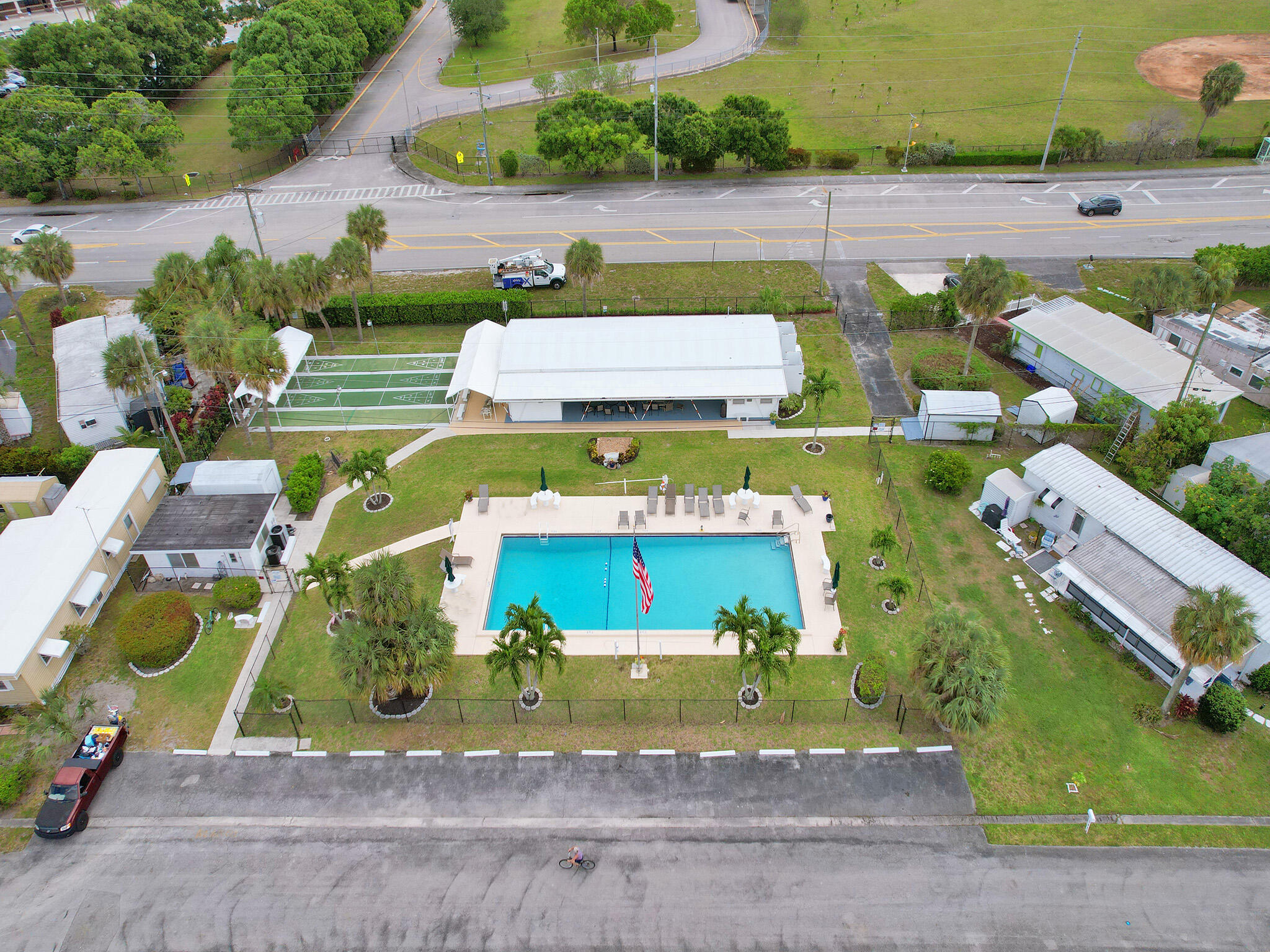 14609 Sunset Drive Delray Beach, FL 33445 - Photo 49 of 50 an aerial view of a house with yard swimming pool and outdoor seating