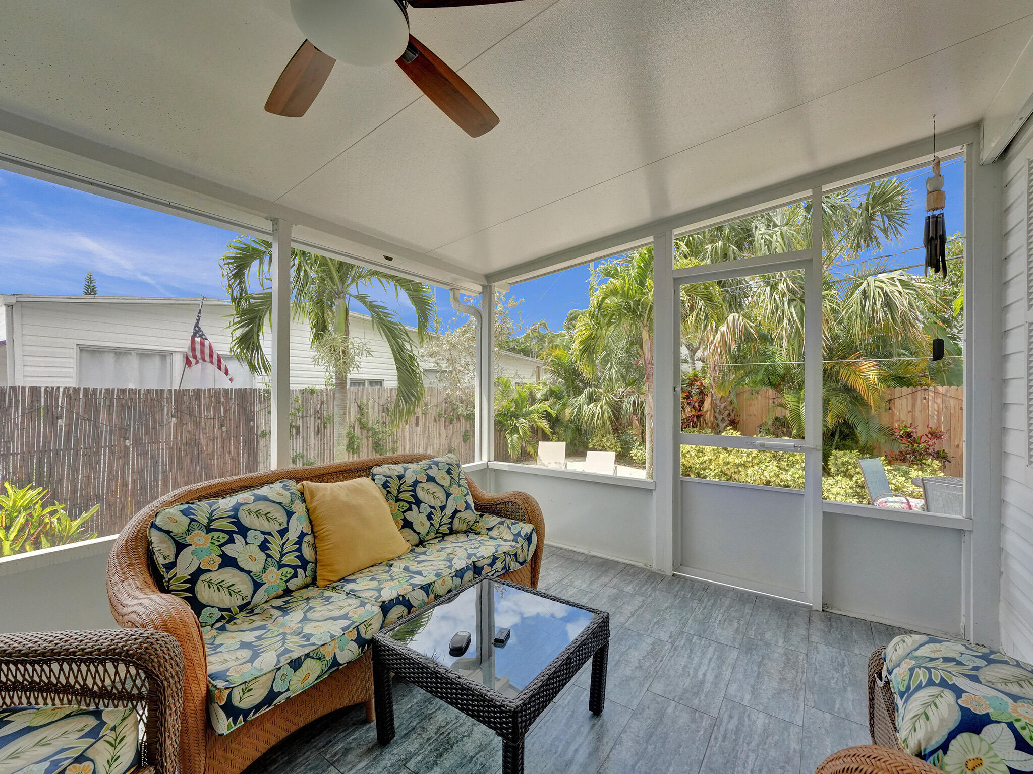 14609 Sunset Drive Delray Beach, FL 33445 - Photo 10 of 50 a living room with furniture and a large window