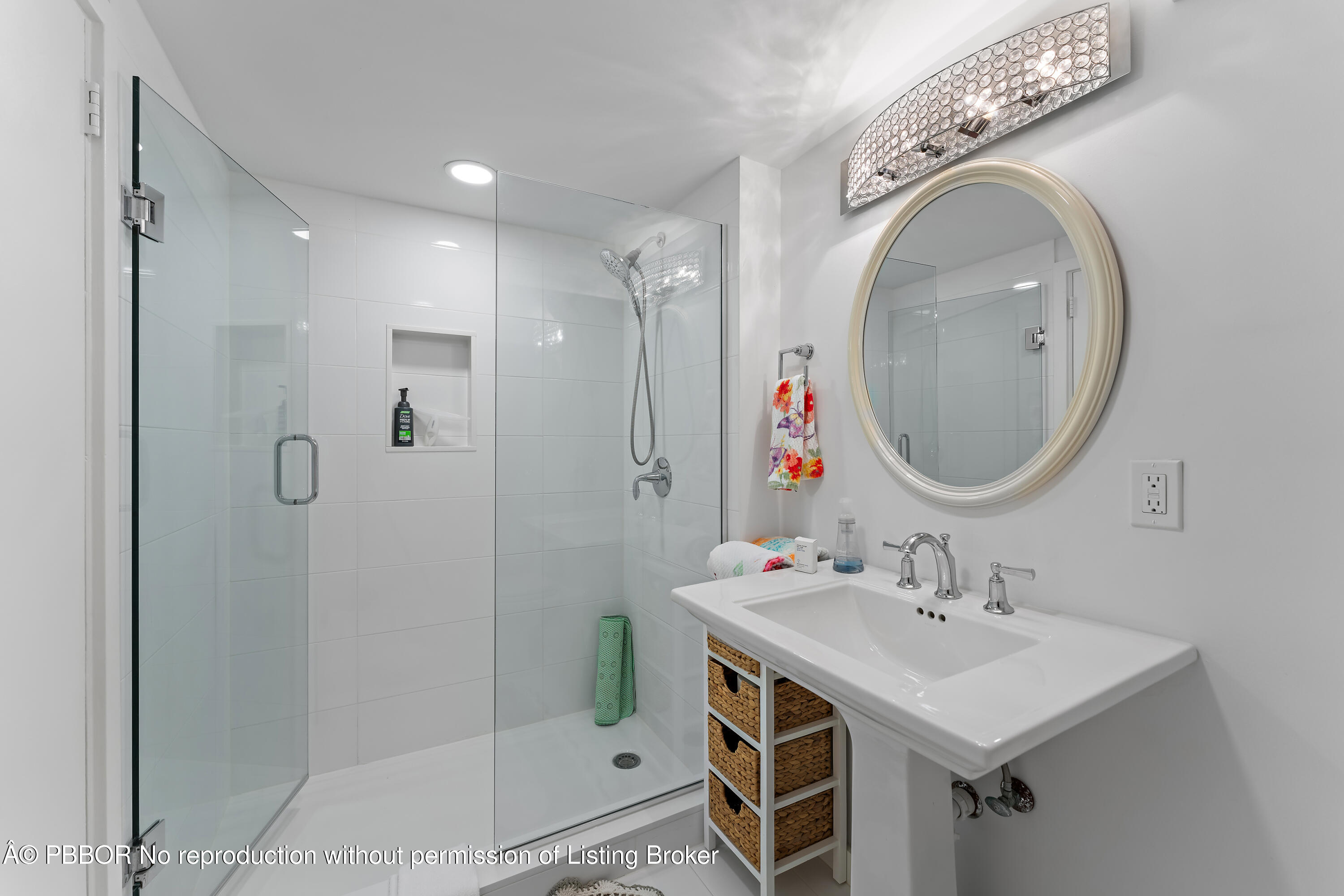 235 Sunrise Avenue, Unit 1107 & 1108 Palm Beach, FL 33480 - Photo 11 of 28 a bathroom with a sink a toilet and shower