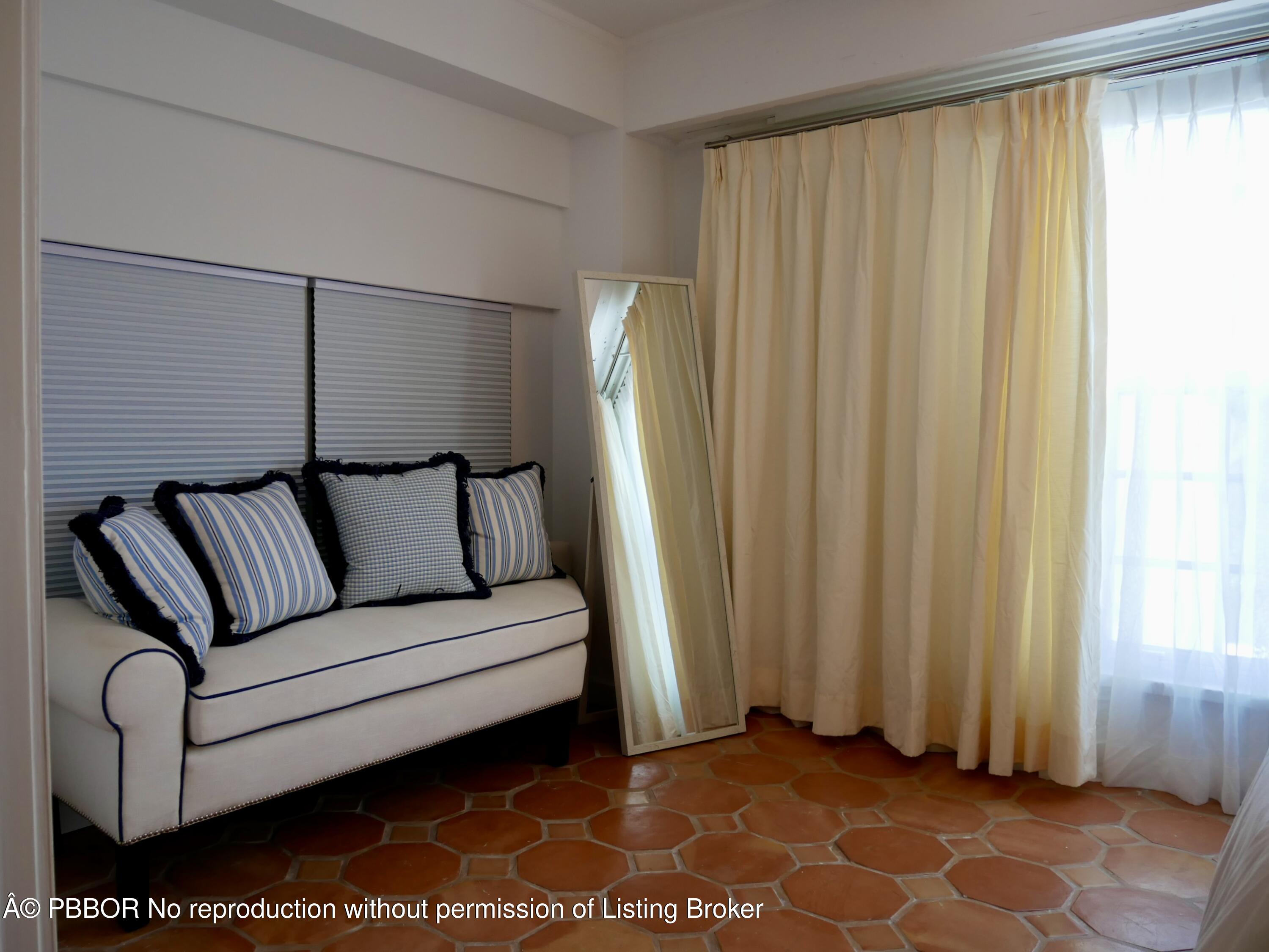 235 Sunrise Avenue, Unit 1107 & 1108 Palm Beach, FL 33480 - Photo 19 of 28 a living room with furniture and a window