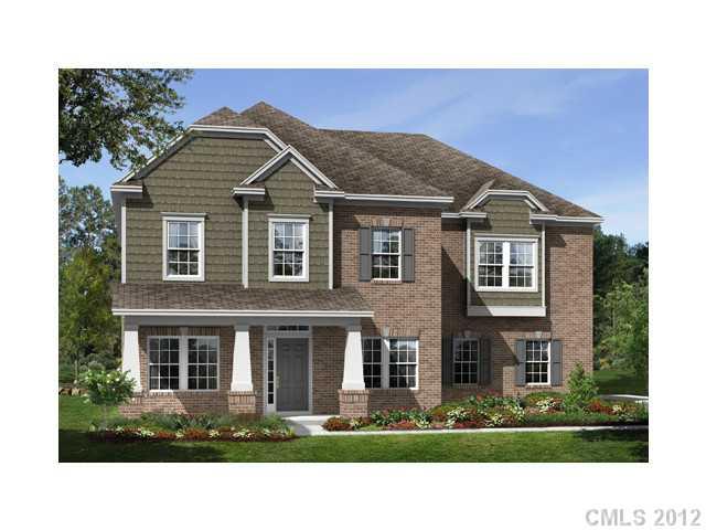 698 Old Cove Road, Unit 44 Tega Cay, SC 29708 - Photo 1 of 1 a front view of a house with a yard