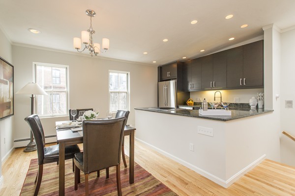 45 Lawrence Street, Unit 2 Boston, MA 02116 - Photo 3 of 10 a view of a dining room with furniture window and outside view