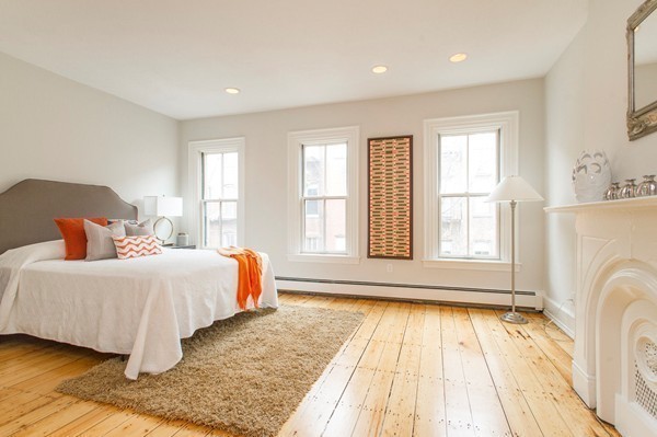 45 Lawrence Street, Unit 2 Boston, MA 02116 - Photo 5 of 10 a spacious bedroom with a bed and wooden floor