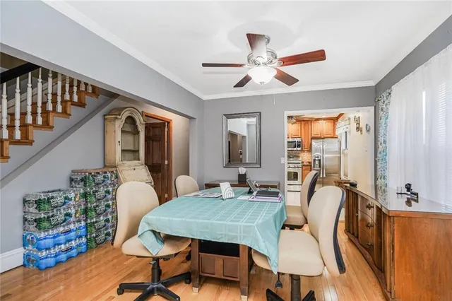 a view of a workspace with furniture and a workspace