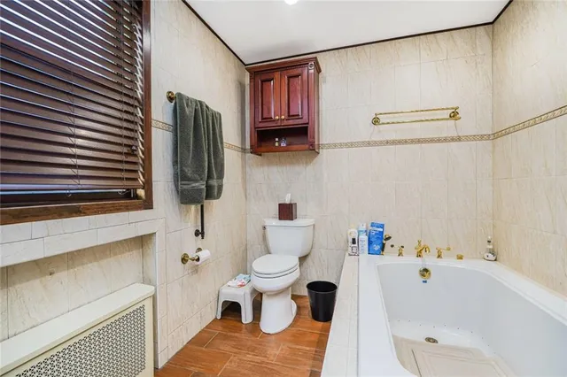 a view of a livingroom with wooden floor