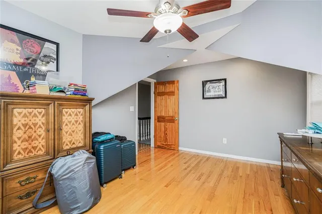 a view of a balcony with an iron fence