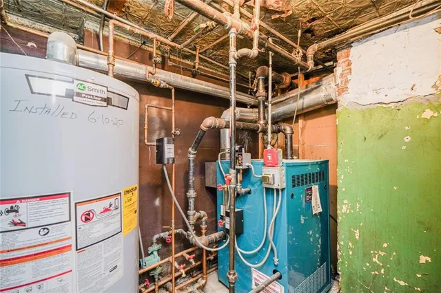 a open kitchen with stainless steel appliances granite countertop a sink and cabinets