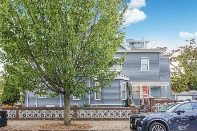 a view of a house with a garage and a garage
