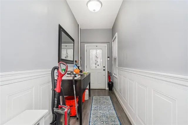 a room with furniture and baby crib