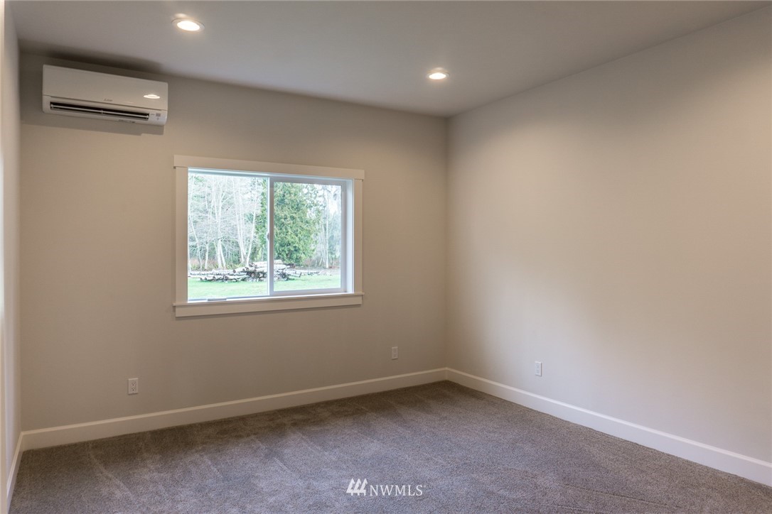 1803 Watkins Road Freeland, WA 98249 - Photo 19 of 25 an empty room with a window
