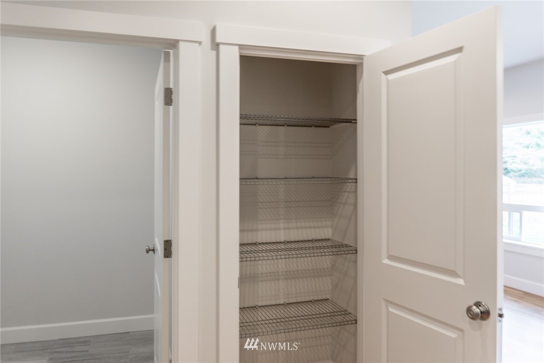 1803 Watkins Road Freeland, WA 98249 - Photo 10 of 25 a view of walk in closet with empty racks