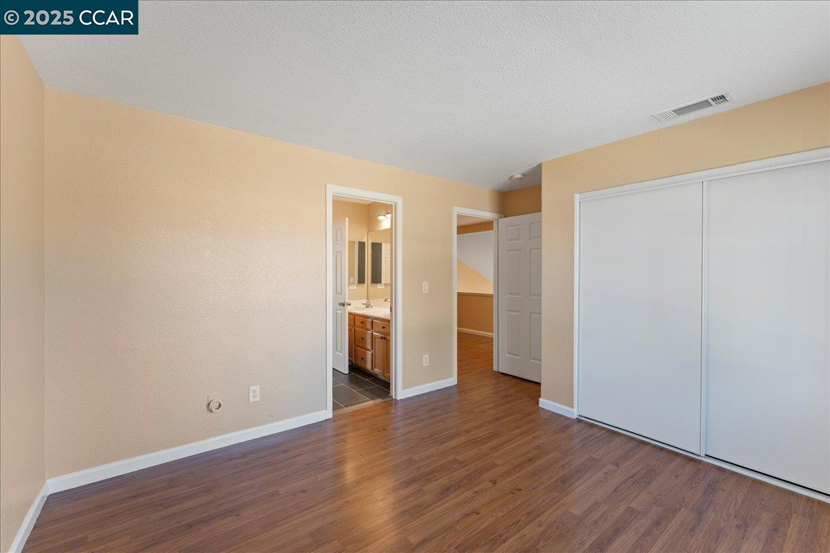 4651 Shetland Way Antioch, CA 94531 - Photo 14 of 34 a view of empty room with wooden floor