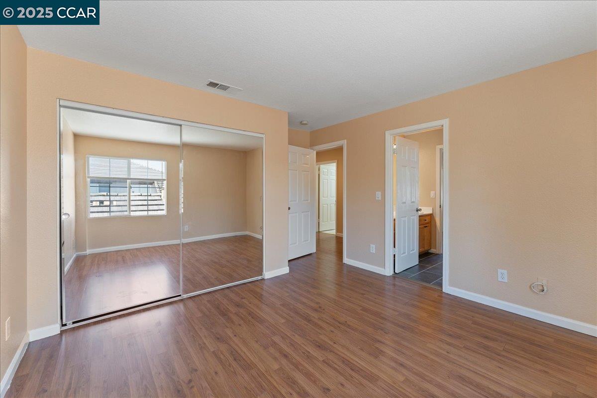 4651 Shetland Way Antioch, CA 94531 - Photo 18 of 34 a view of livingroom with hardwood floor and hallway