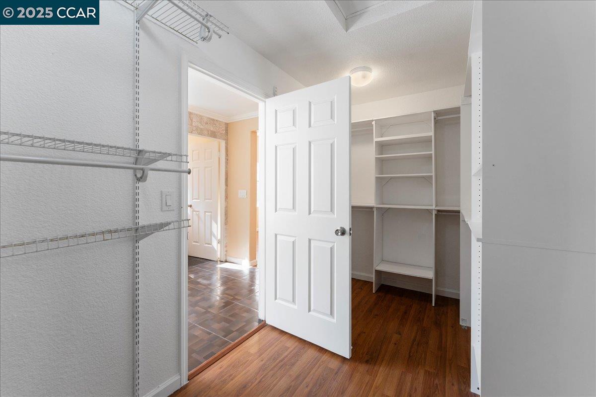 4651 Shetland Way Antioch, CA 94531 - Photo 23 of 34 a view of walk in closet with empty racks